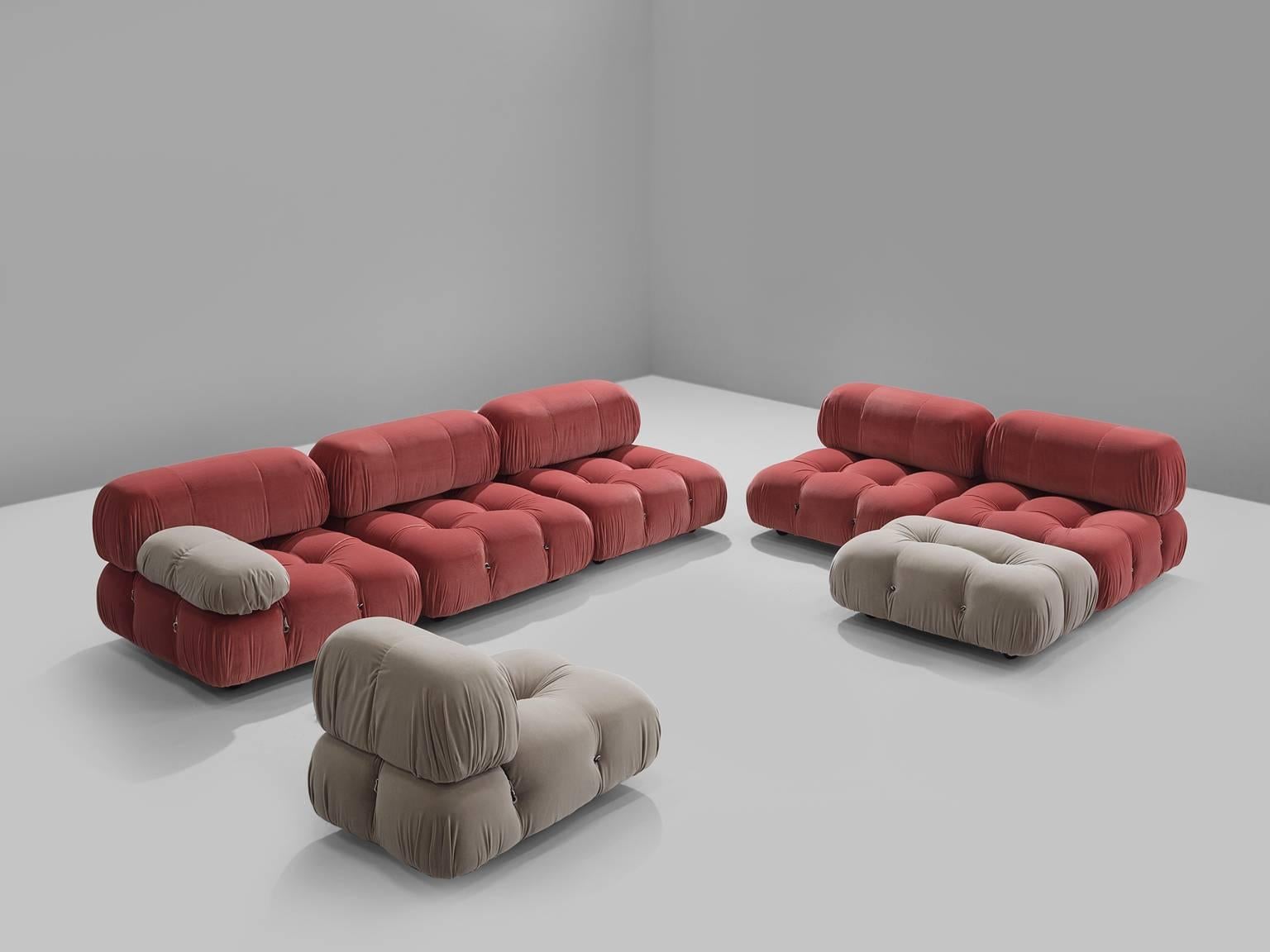 Mario Bellini, large modular 'Cameleonda' sofa in pink and grey Italy 1972.

The sectional elements of this can be used freely and apart from one another. The backs and armrests are provided with rings and carabiners, which allows the user to create