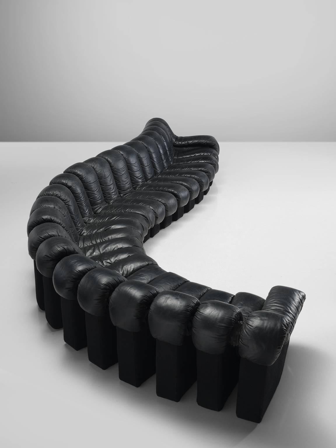 De Sede ‘Snake’ DS-600, black leather, felt, Switzerland, 1972. 

De Sede 'Non Stop' sectional sofa containing 22 pieces in original black leather, of which 20 center pieces and two armrests. Any number of pieces can be zipped together ensuring an