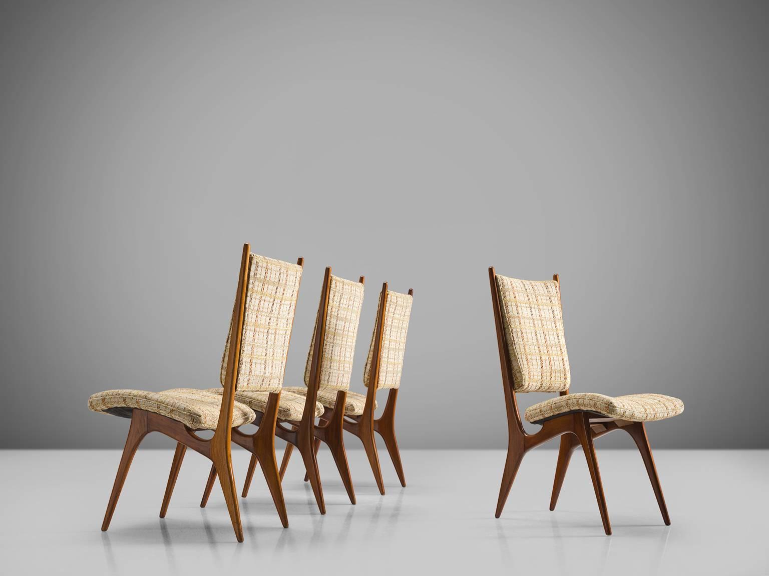 Vladimir Kagan, set of four dining chairs, walnut, cane, fabric, United States, circa 1955.

This set of chairs is designed by Vladimir Kagan for Hugo Dreyfuss. The set of four chairs is sensuous, sculptural and elegant. The chairs feature high
