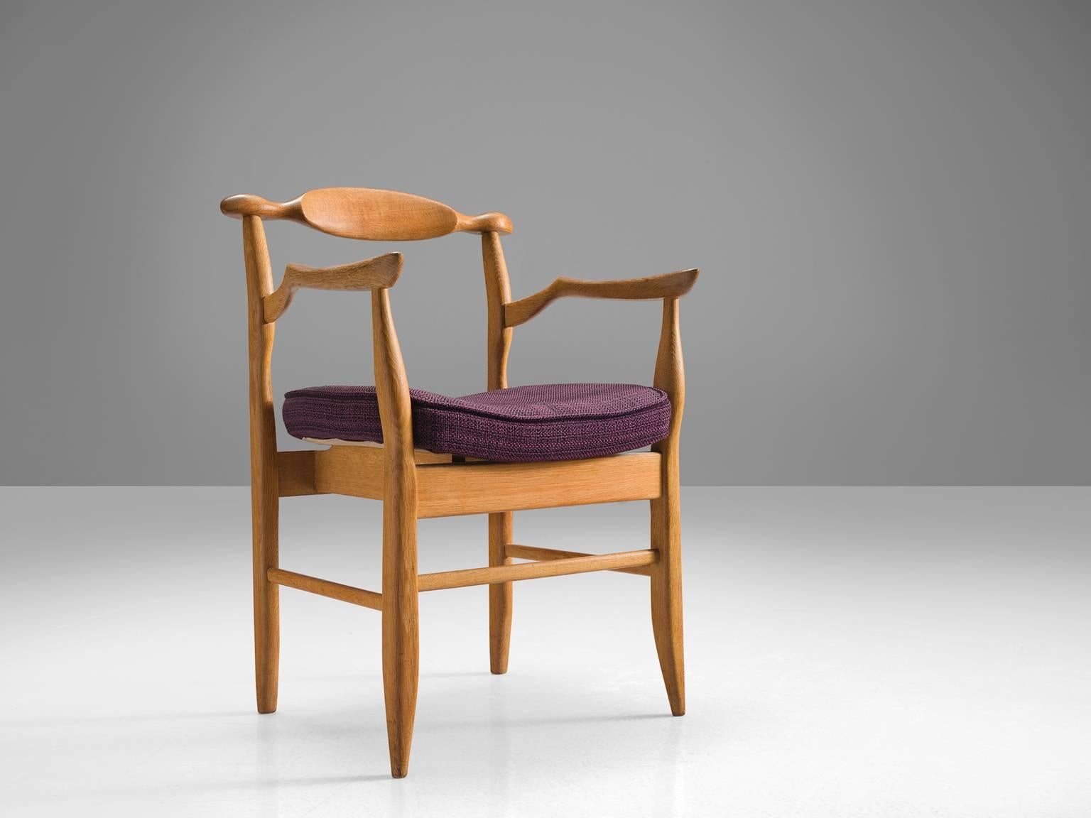 Guillerme et Chambron, armchair model 'Fumay,' oak and fabric, France, 1965.

Beautiful shaped armchair in blond oak by French designer duo Jacques Chambron and Robert Guillerme. This chair shows beautiful lines in every element. Starting with the