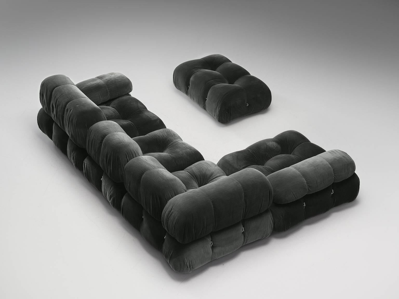 Mario Bellini, large modular 'Cameleonda' sofa in grey velvet, Italy, 1972.

The sectional elements of this can be used freely and apart from one another. The backs and armrests are provided with rings and carabiners, which allows the user to create