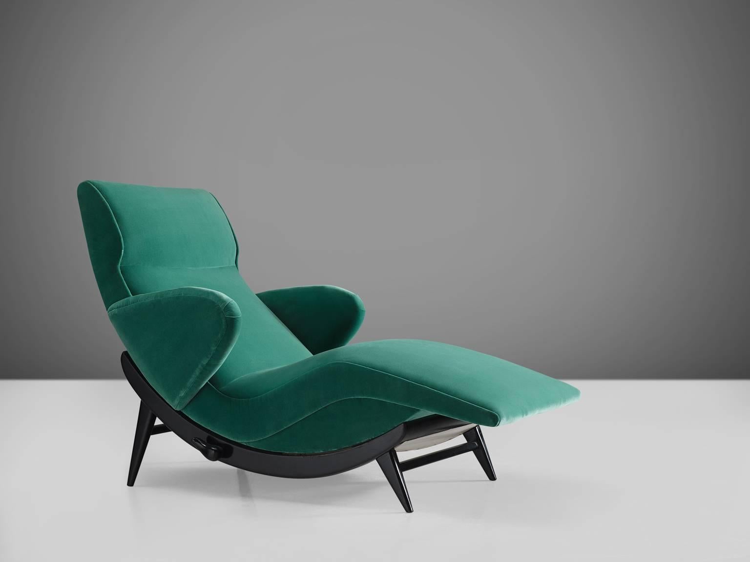 Chaise longue, in beech and fabric, Italy, 1970

This chaise longue is designed in Italy and is part of the midcentury design collection. The stained beech frame is curved and has four tapered legs.  The curved frame in combination with the