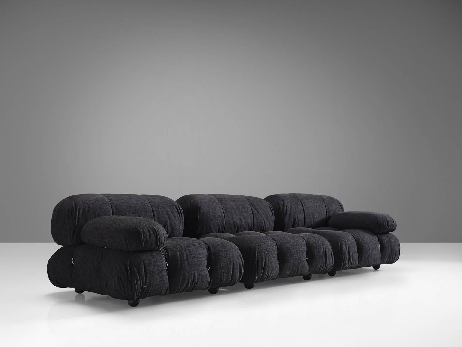 Mario Bellini, modular 'Cameleonda' sofa in original grey fabric, Italy, 1972.

The sectional elements of this can be used freely and apart from one another. The backs and armrests are provided with rings and carabiners, which allows the user to