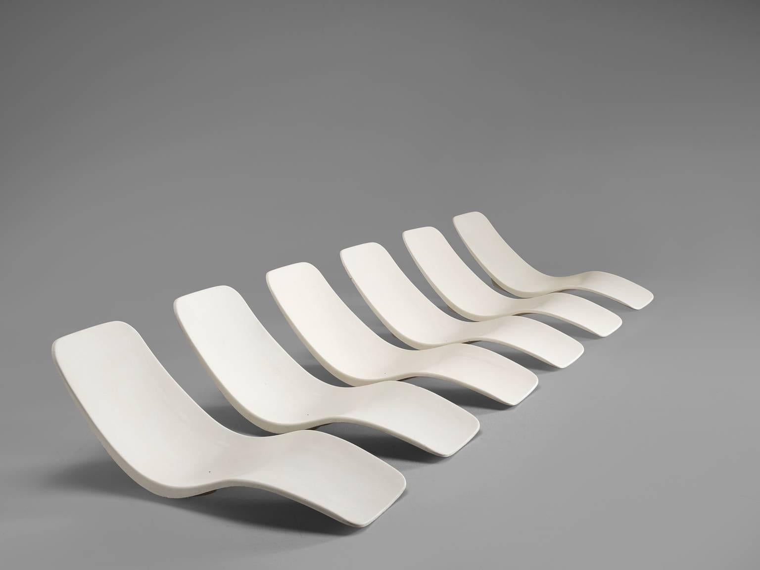 Charles Zublena for Les Plastiques de Bourgogne, lounge chairs, white fiberglass, France, 1960.

These lounge chairs by Charles Zublena are minimalist and functional in their design. The molded fiberglass is perfectly designed to support the human