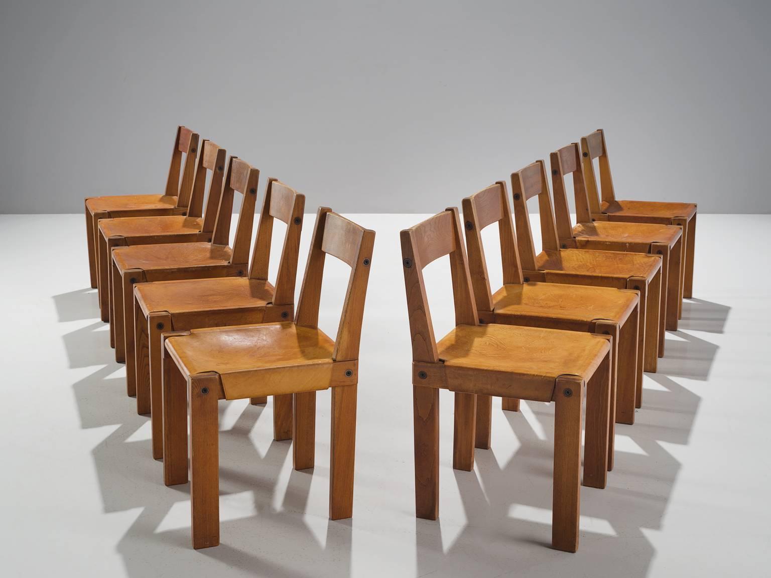 Pierre Chapo, set of ten chairs model S24, in elm and leather, France, 1960s.

Large set of ten dining chairs by French designer and carpenter Pierre Chapo. This chair was designed by Chapo for his friend Dr. Hiroshi Nakajima. The chairs consist