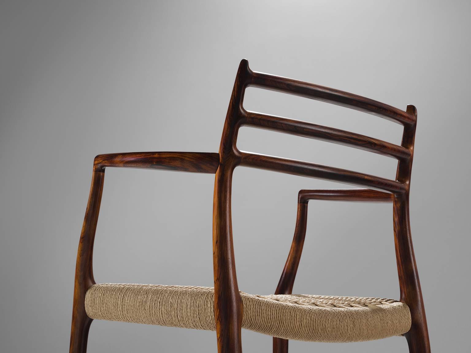 Mid-20th Century Niels O. Moller Set of Eight Dining Chairs in Rosewood and Cane Upholstery
