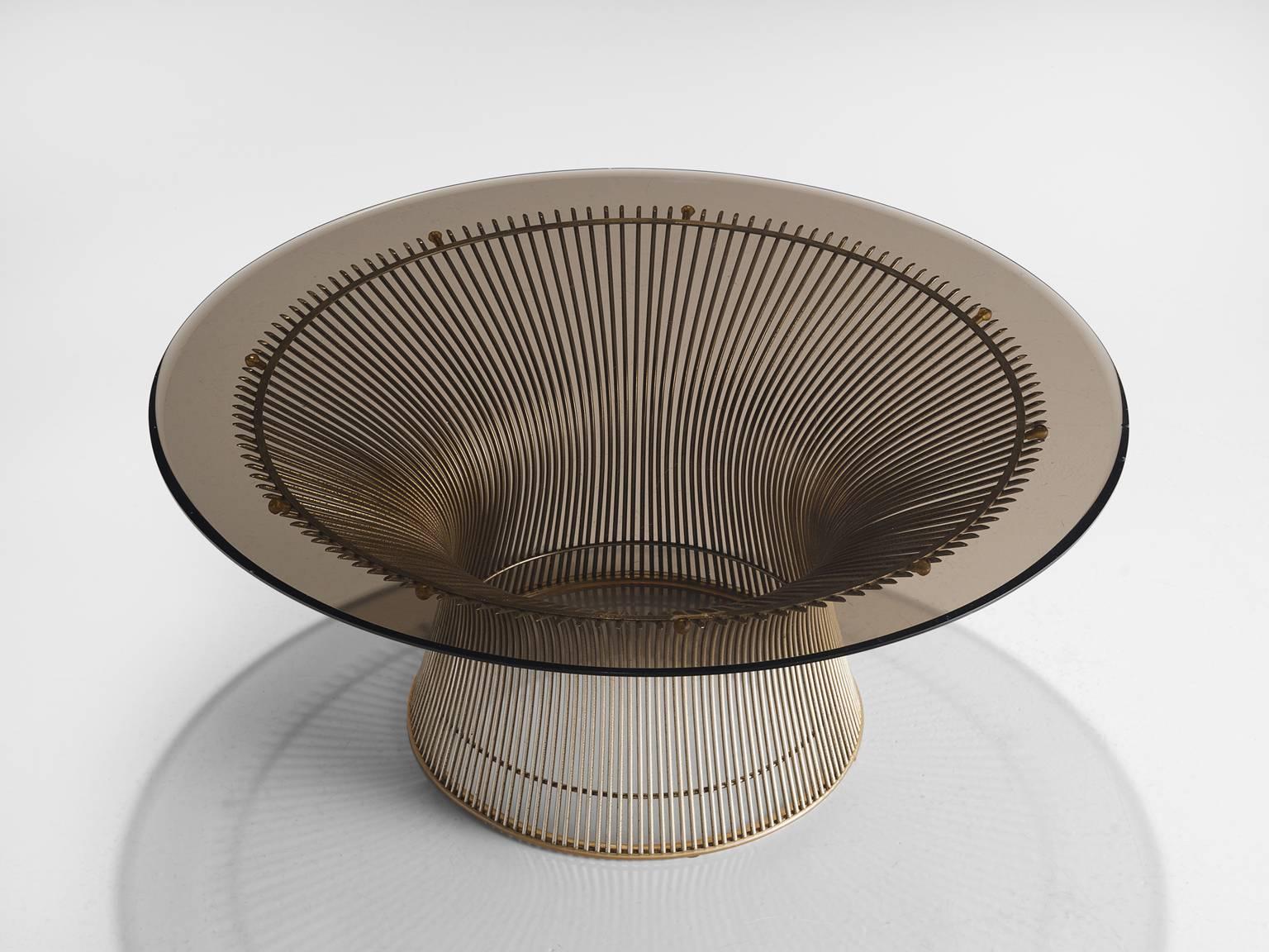 Warren Platner for Knoll, cocktail table, glass and metal, United States, 1966, 1980s production. 

This iconic coffee table by Warren Platner is created by welding curved steel rods to circular and semi-circular frames, simultaneously serving as