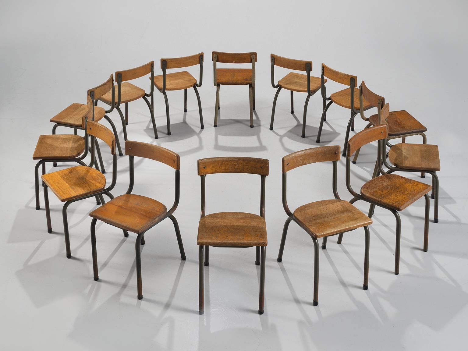 Willy Van Der Meeren, set of 14 chairs, steel and wood, Belgium, 1957.

This set of Industrial Belgian chairs is designed by the Belgian designer Willy Van Der Meeren. The exceptional elements of these chairs is the fact that they are made of solid