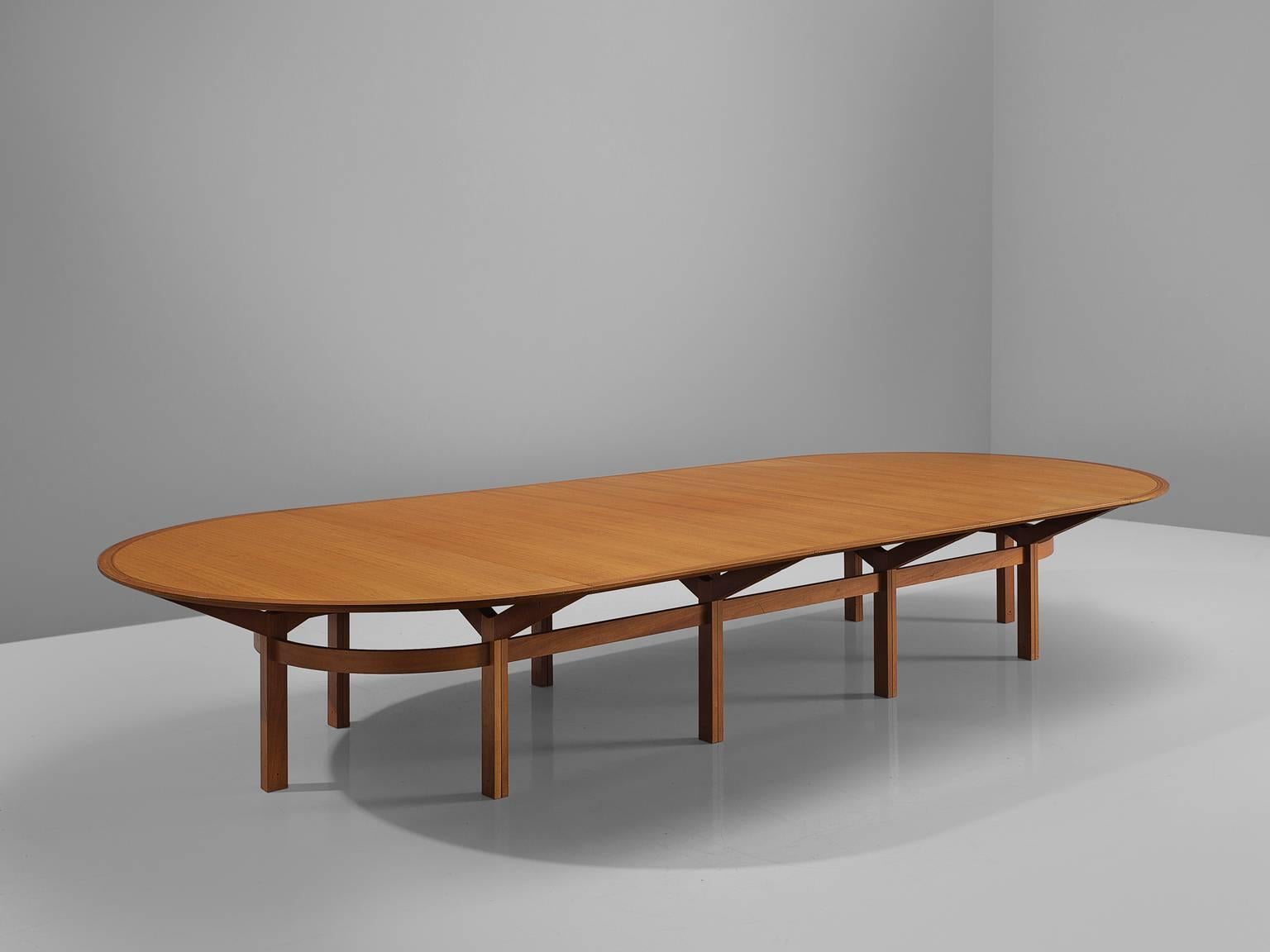 Rud Thygesen and Johnny Sørensen, conference table, teak, Denmark, circa 1950. Measure: 4.7mt.

This oval conference table is designed by the Danes Rud Thygessen and Johnny Sørensen. The table features a large oval top with tripod legs and a rim