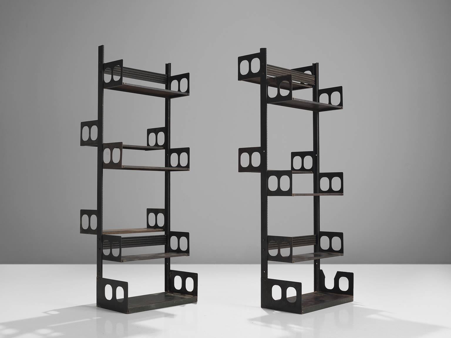 Lips Vago, pair of deep green bookcases, metal, Italy, 1954.

This early variant of the ‘Congresso’ shelf is a modest and strong bookcase made out of steel sheets with holes on the sides creating a strong graphic pattern. This early model has been