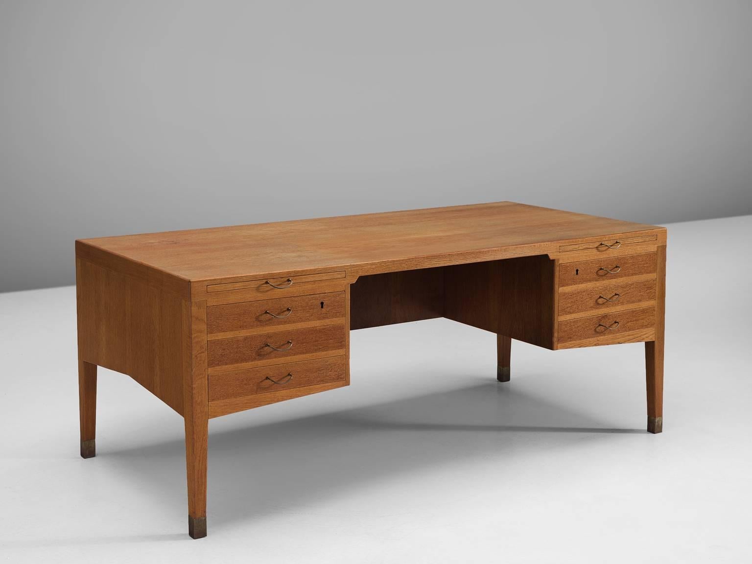 Alfred Hendrickx desk, teak, brass, Belgium, circa 1950

This freestanding desk in teak and brass is designed by the Belgian designer Alfred Hendrickx. The most interesting thing about this desk is perhaps that it is free-standing. It has an open