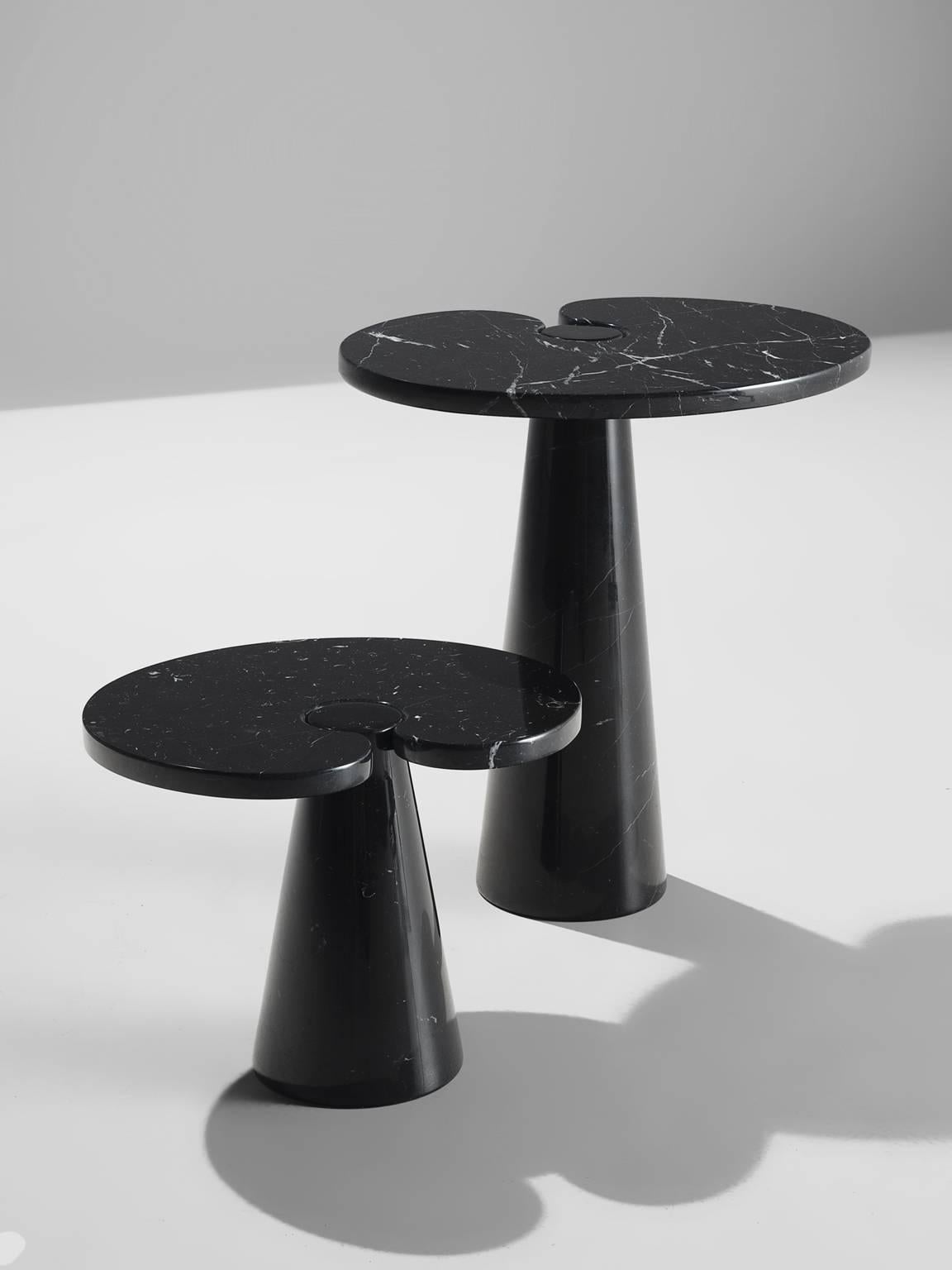 Angelo Mangiarotti, cocktail tables in black marble, Italy, 1970s. 

These sculptural table by Angelo Mangiarotti are a skillful example of postmodern design. The lotus leaf like table features no joints or clamps and is architectural in its