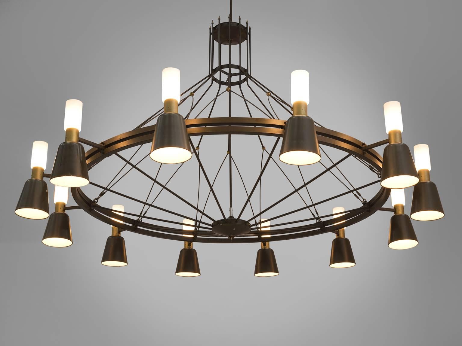 Chandelier, metal, glass the Netherlands, circa 1950.

This large Dutch chandelier is very refined and vibrant. The chandelier is made in the 1950s by a local designer in the Eastern region of the Netherlands. The chandelier features twelve shades