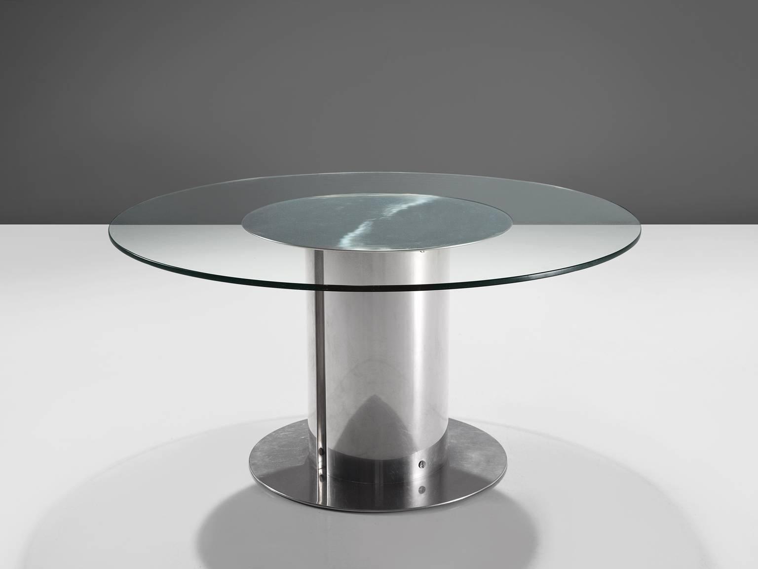Antonia Astori for Cidue, Cidonio dining table, chromed metal, glass, Italy, ca. 1950. 

This postmodern centre table with chromed industrial foot features a circular glass top and a brushed chromed metal base. The table is designed for Cidue and
