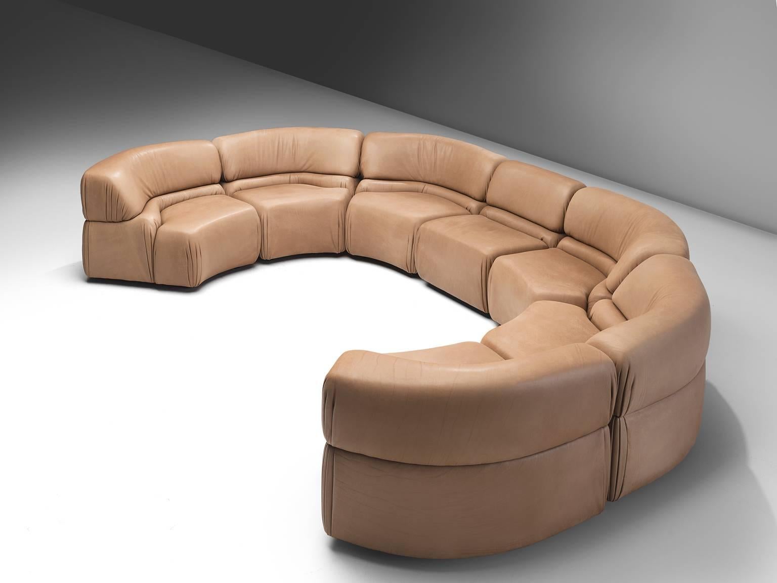 De Sede 'Cosmos', beige brown leather, seven elements, Switzerland, 1970s.

Thick, high-quality modular sofa made by De Sede in Switzerland in the 1970s. Due to the separate elements, the couch can be used in a variety of different positions. The