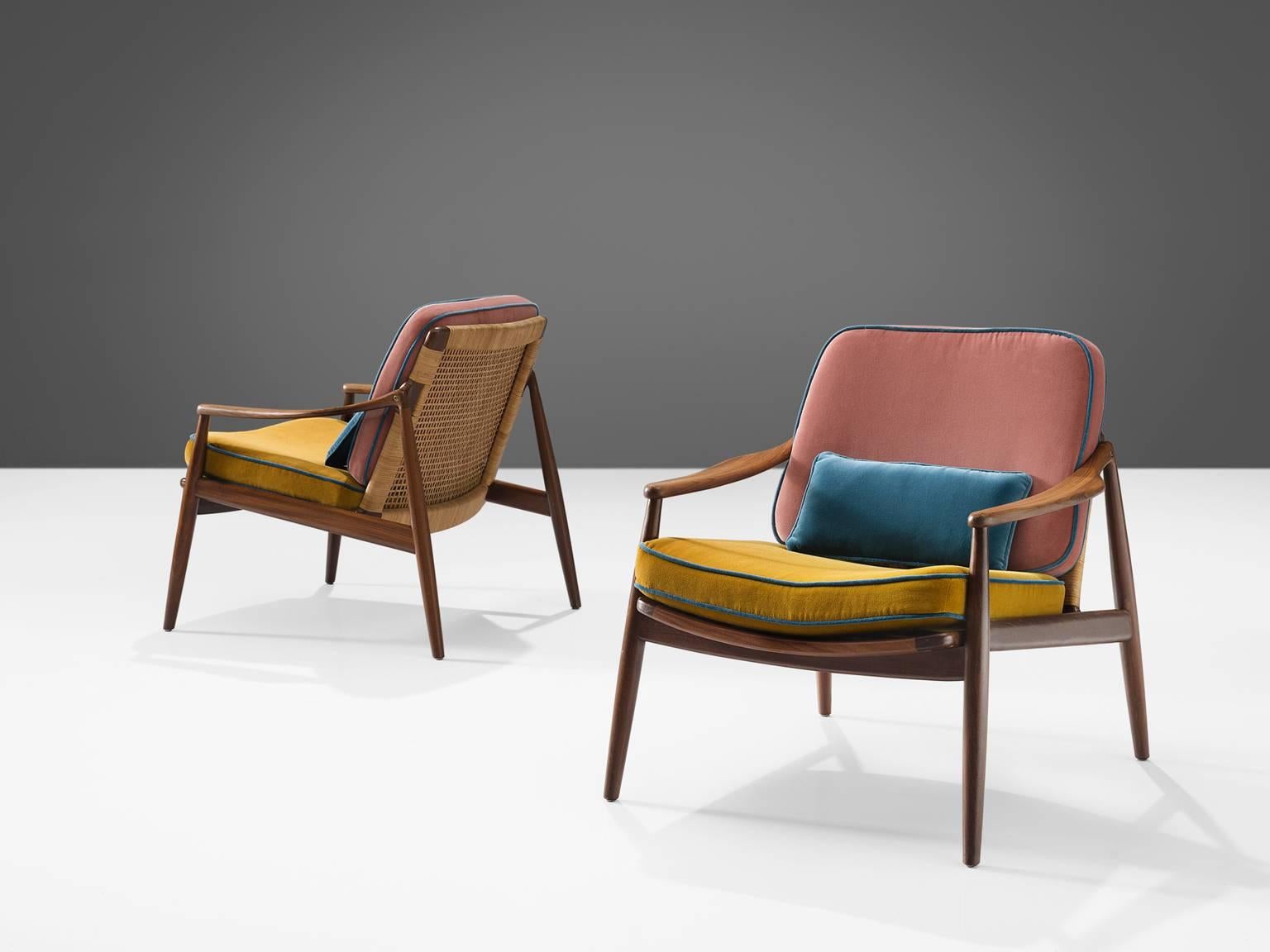 Hartmut Lohmeyer for Wilkhahn, armchairs,  teak, cane, blue, yellow, pink velvet upholstery, Germany, design 1956, production 1960s.

This low reclining armchair is sensuous and is organically shaped. They feature a slightly tilted back and are