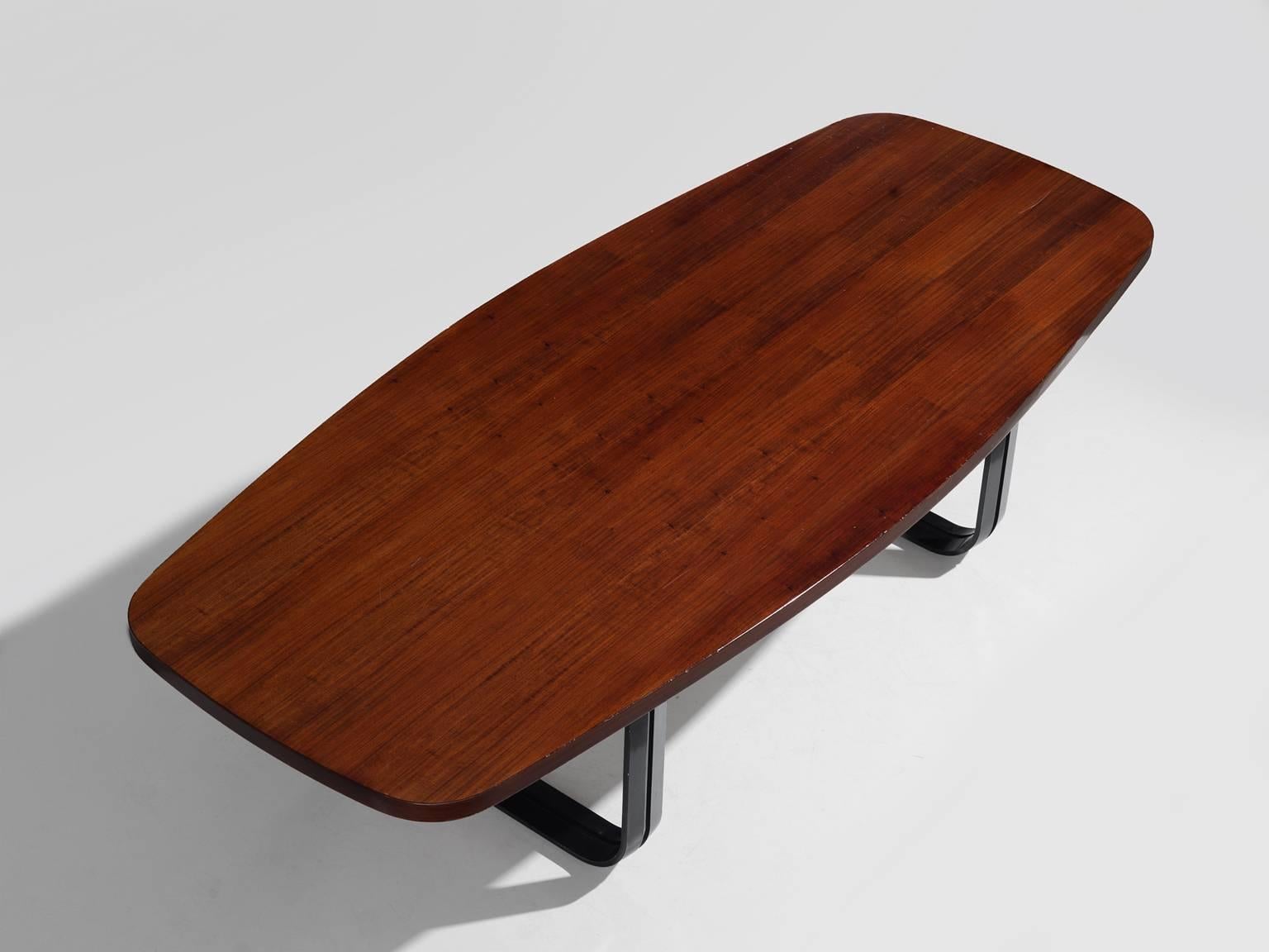 MIM Roma, conference table in walnut and black metal, Italy, 1960s.

Luxurious boat shaped table with a walnut top. The walnut veneer shows a nice patina and has a clear shape. The rounded corners and smooth edges give the table an elegant