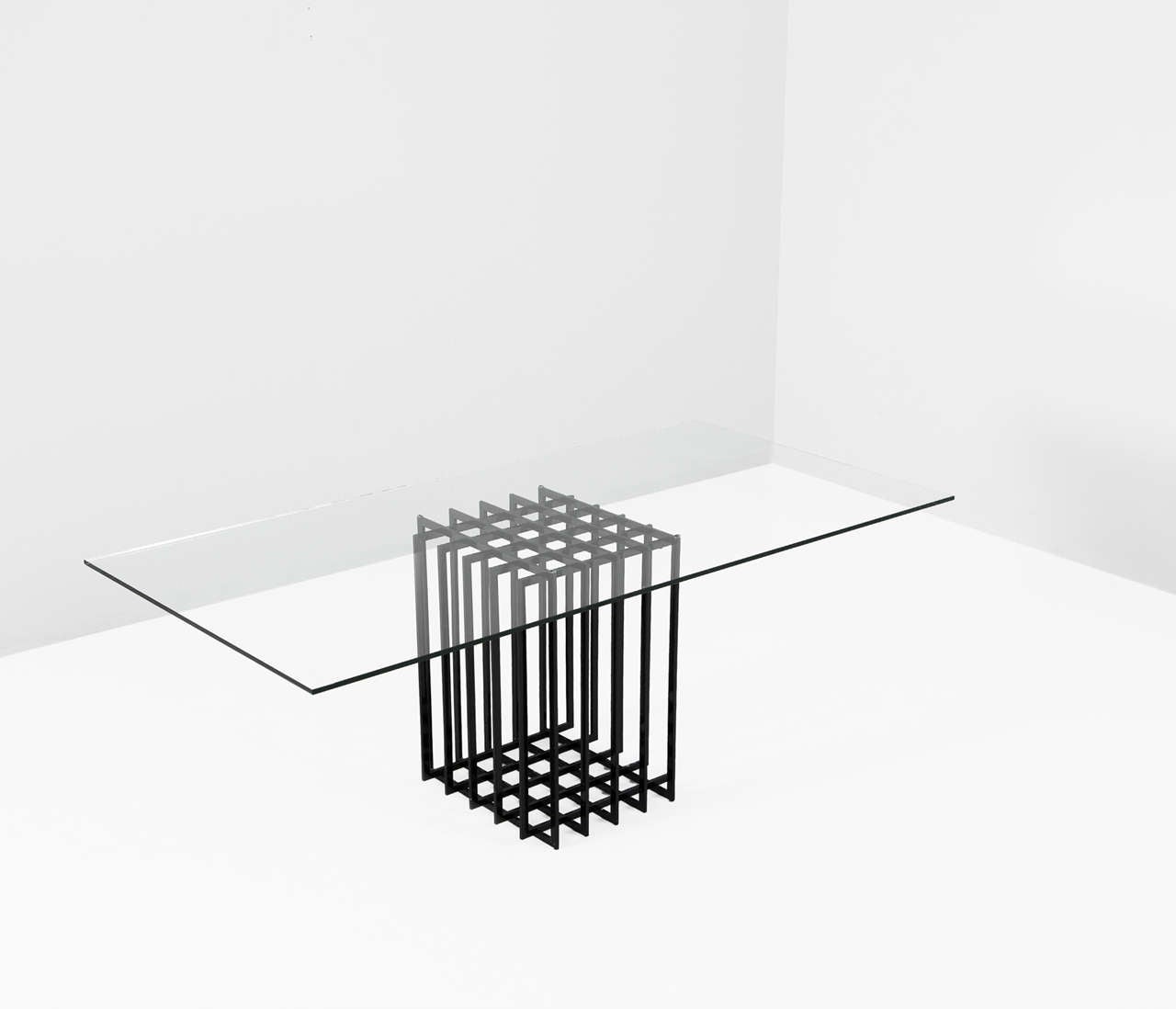 Table, in glass and metal, by Pierre Cardin, France, 1960s. 

Architectural writing or dining table by Pierre Cardin in black-coated steel. Due the use of a grid, the table features an elegant open expression. The clear glass top beautifully