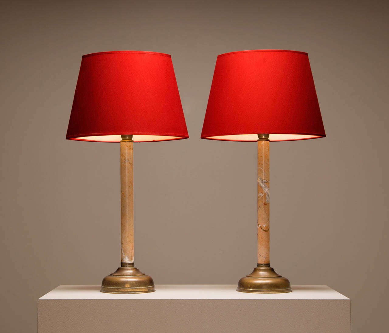 Tommaso Barbi, pair of table lamp, marble, red canvas, brass, Italy.

Unique pair of Italian table lamps with nice marble stem and brass foot with nice patina to the surface. The combination of the colors and materials in this lamp is well