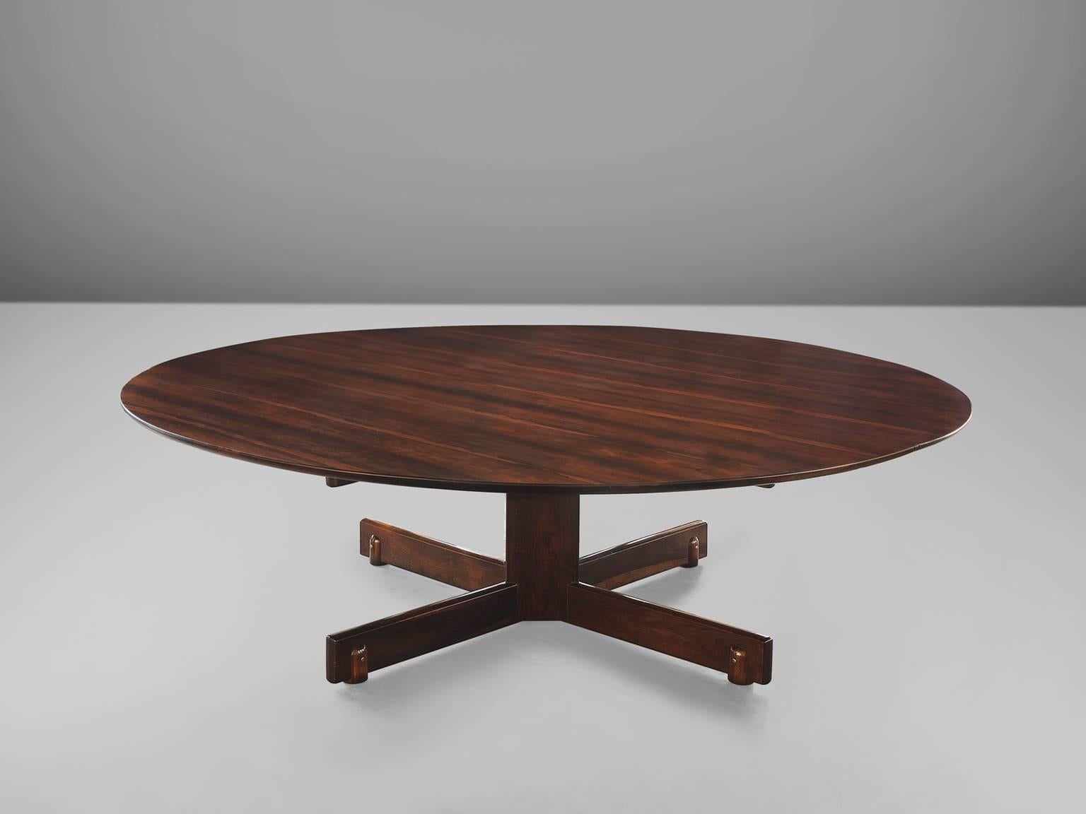 Sergio Rodriguez, large rosewood table, Brazil, 1950s

This grand dining table has been custom made for a private client in Rio de Janeiro. The table has been in made on request and therefore it is a unique design. The table with a diameter of 250