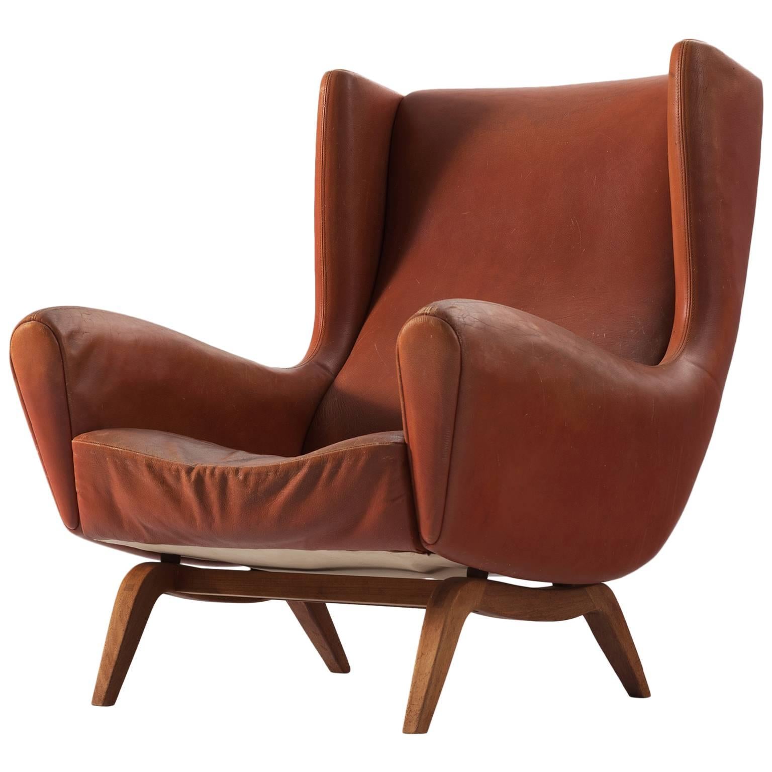 Illum Wikkelso Lounge Chair in Cognac Leather