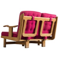 Solid Oak Sofa by Guillerme et Chambron with Pink Cushions
