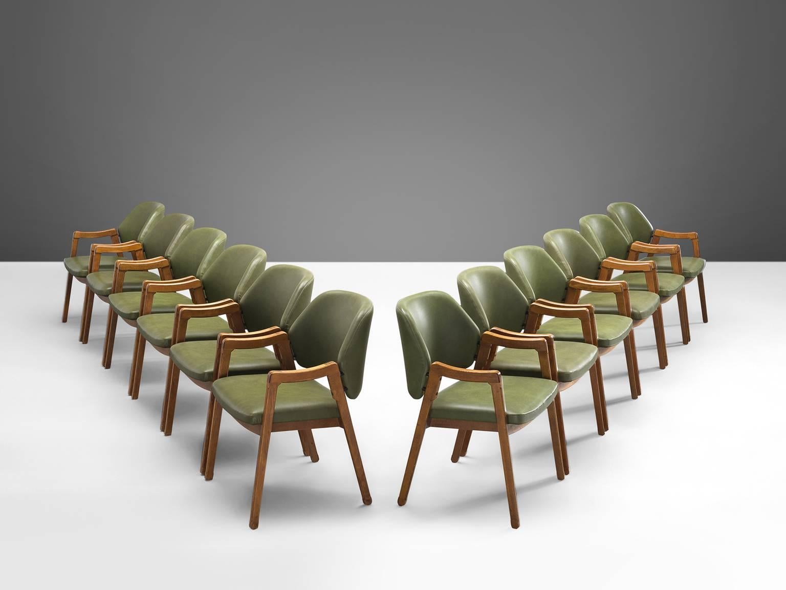Twelve armchairs by Ico Parisi for Cassina, beech and leatherette, Italy, 1963.

This large set of green conference chairs '814' were are executed to perfection and provide great comfort. These chairs look almost sculpted thanks to the exquisite