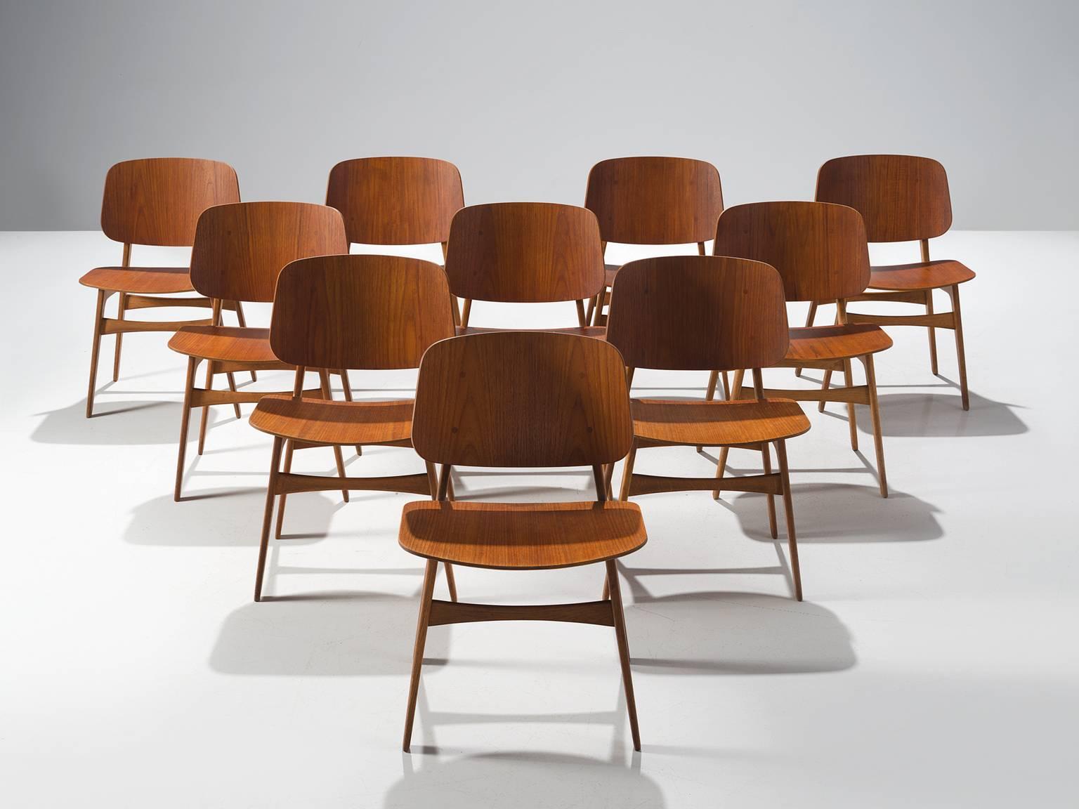 Børge Mogensen for Soborg, Shell chairs, teak, Denmark, circa 1950. 

This set of chairs is derived from the Shell Chair that Mogensen designed in 1949 for the cabinetmakers guild. The shell chair distinguishes itself by the use of a plywood