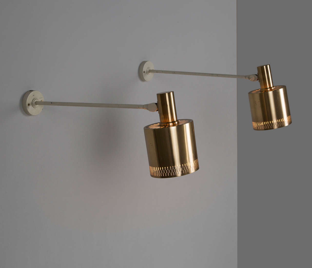 Mid-20th Century Four Swedish Wall Lamps in White Metal with Brass Shades