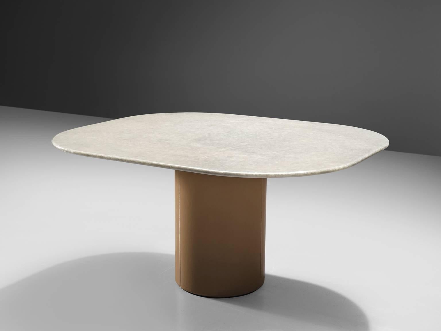 B&B Italia, dining table, marble, leather, Italy, 1970s.

Centre table with cognac leather base and white marble top. The combination of material, leather and marble that from a strong yet balanced contrast. The bright white veins shows beautiful