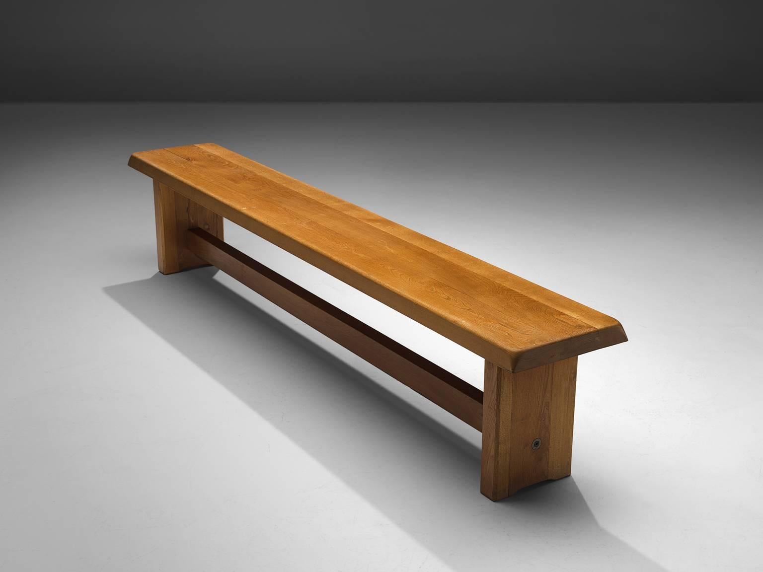 Pierre Chapo, bench S14D, elm, France, 1950s. 

This elm bench is designed by the French designer Pierre Chapo. The rectangular top features sloping edges, rests on a two-legged base with a connecting horizontal beam. The strong an simplified