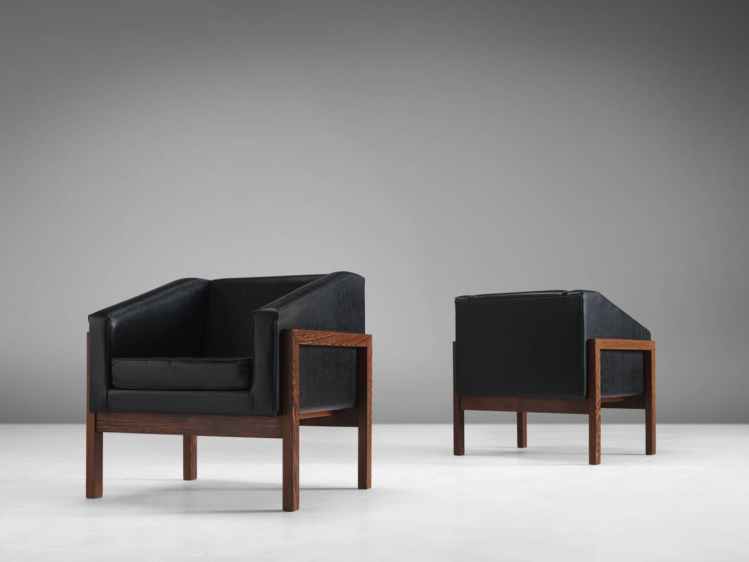 Wim Den Boom, set of lounge chairs, black faux leather, wenge, the Netherlands, 1960.

This set of office chairs is designed by Wim Den Boon voor a Dutch client from The Hague. The monumental chairs are a one of a kind as they are especially
