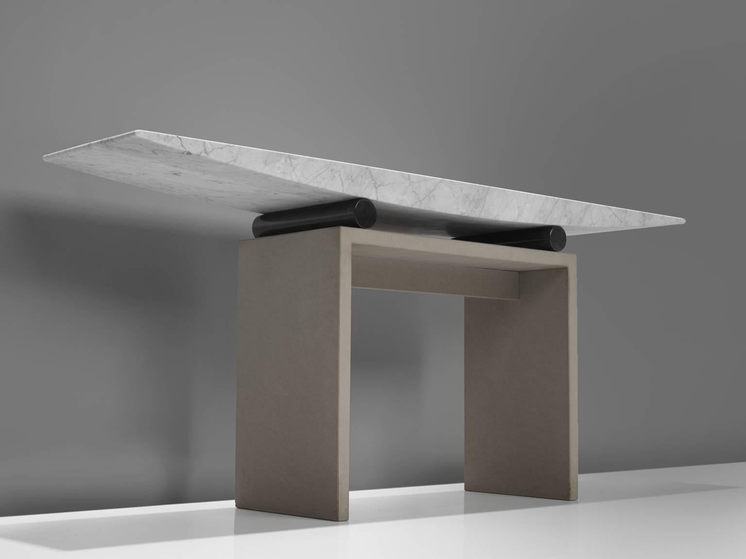Danilo Silvestrin, console table 'Amanta II', marble, stone, Italy, 1980.

This console table 'Consolle Amanta II' shows a wonderful combination of architectural shapes. The table holds various contrasting shapes and materials such as stone versus