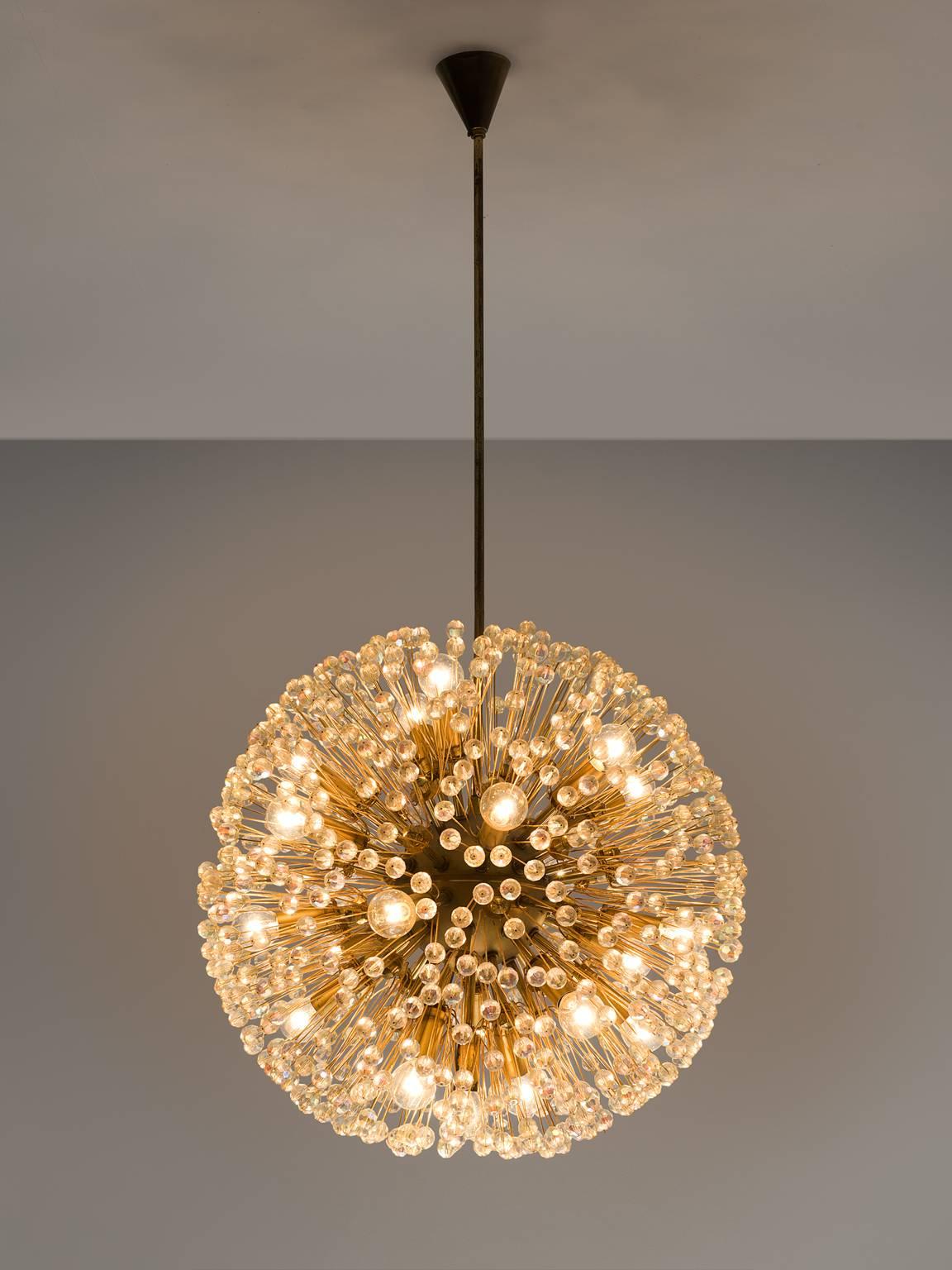 'Sputnik' chandeliers, in the style of Emil Stejnar for Rupert Nikoll, brass and glass, Austria, 1960s.

The brass sputnik shaped frame is very elegantly finished with several diamond shaped glass ornaments and faceted glass beads. The glass