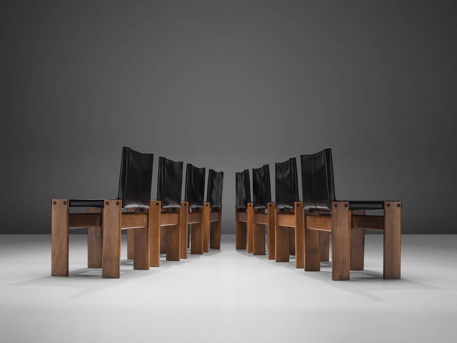 Afra & Tobia Scarpa, monk dining chairs, wood and black leather, Italy, 1974.

The wonderfully deep black leather forms a striking combination with the blond wood. Interesting is the 'flat' shape of this chair where the designer has chosen to