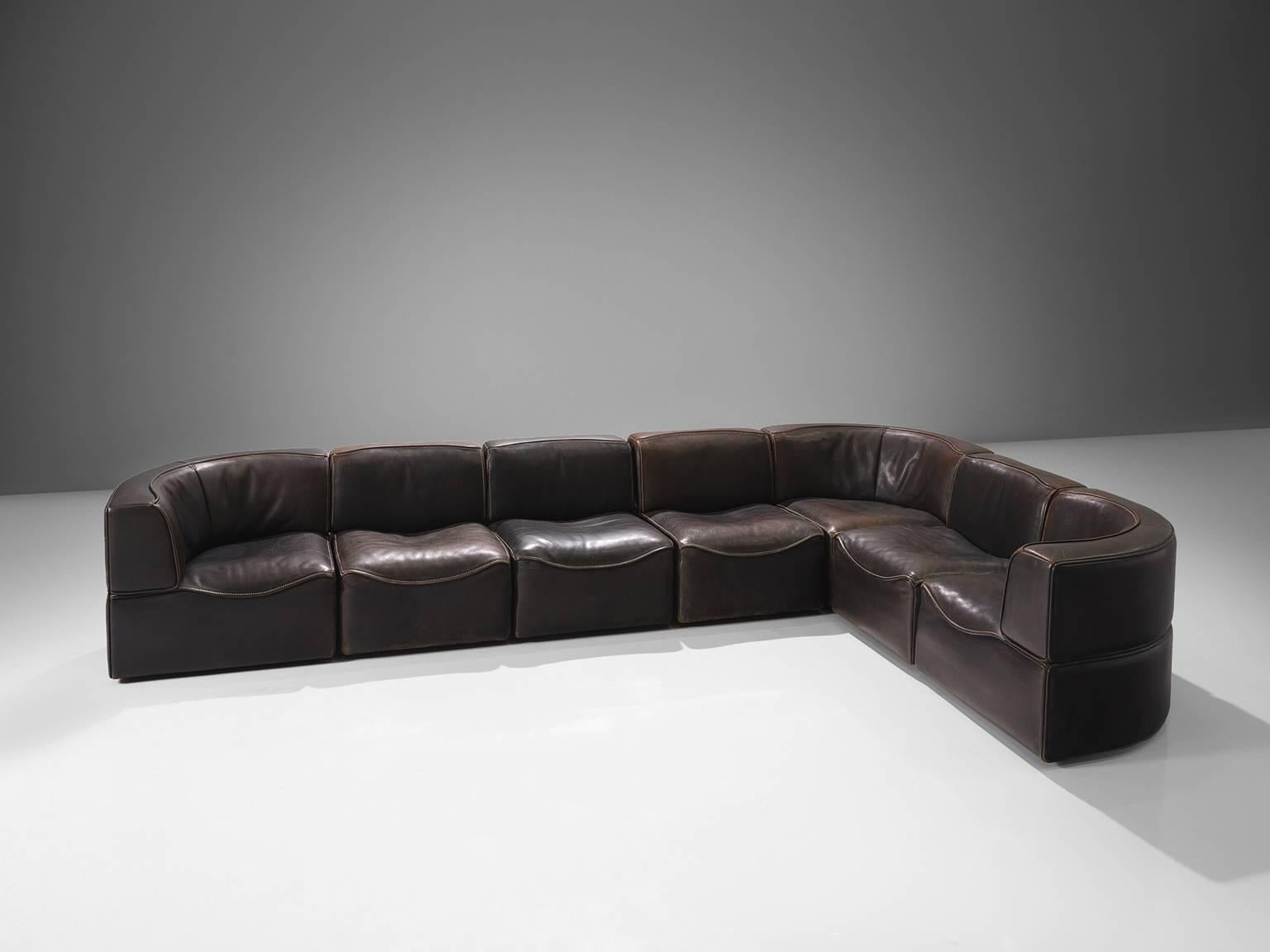 De Sede', DS15 sofa, patinated brown leather, seven elements, Switzerland, 1970s.

Thick, high-quality modular sofa made by De Sede in Switzerland in the 1970s. Due to the separate elements, the couch can be used in a variety of different