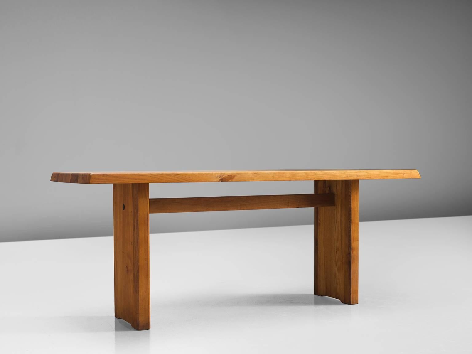 Pierre Chapo, dining table model T14D, elmwood, France, 1960s. 

This dining table is designed by the French designer Pierre Chapo. The rectangular tabletop with sloping edges, rests on a two-legged base. Strong an simplified design which clearly