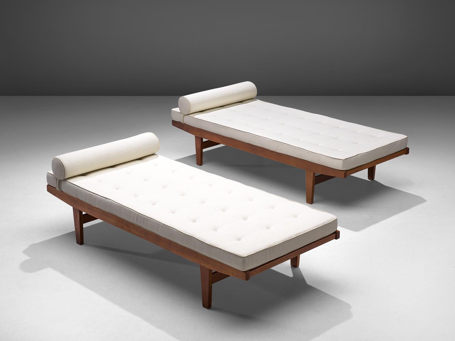 Poul M. Volther, daybes, teak and fabric, Denmark, 1950s.

These daybeds are modest and simple in their design, which are well-constructed. The reversible mattress has been carefully reupholstered by the experienced craftsmen of our in-house