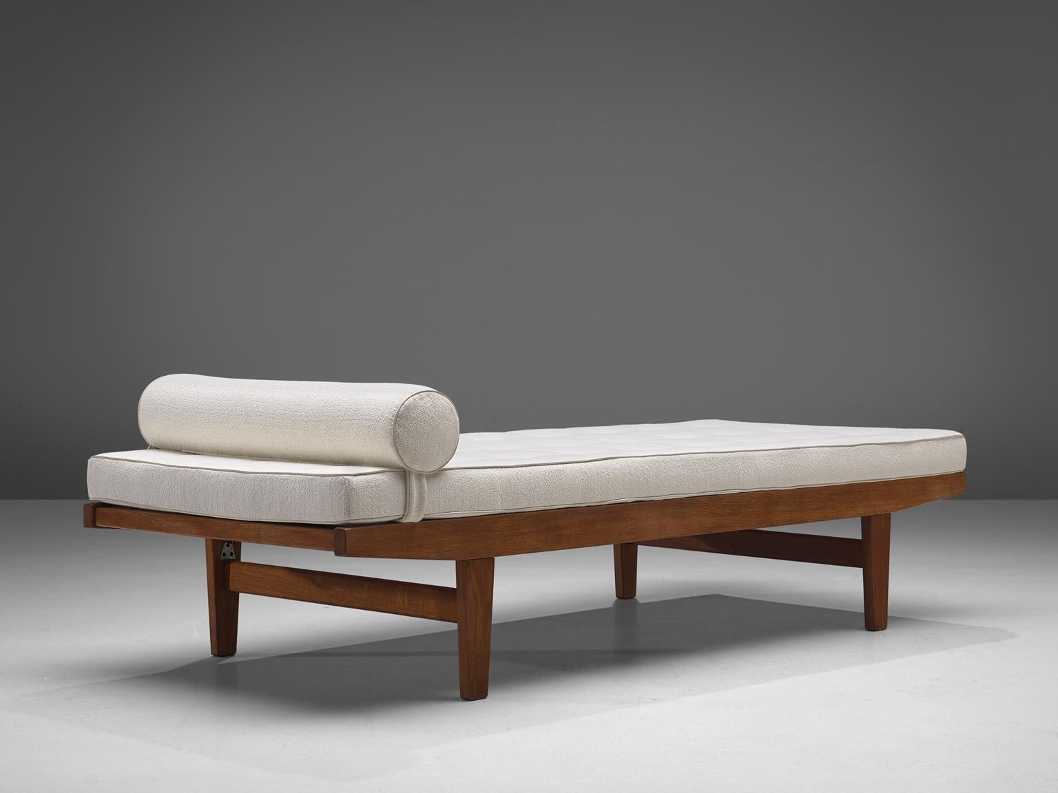 Poul M. Volther, daybed, teak and fabric, Denmark, 1950s.

This daybed is modest and simple in its design, which is well-constructed. The reversible mattress has been carefully reupholstered by the experienced craftsmen of our in-house atelier.