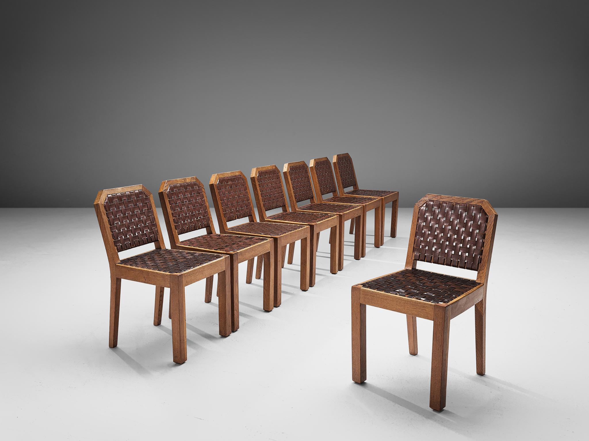 Set of 8 dining chairs, oak and leather, France, 1940s

This set of 8 French dining chairs has a sturdy design, with strong proportions. The frame consists of bulky lines of which the front legs are straight and thick, while the hinge legs are