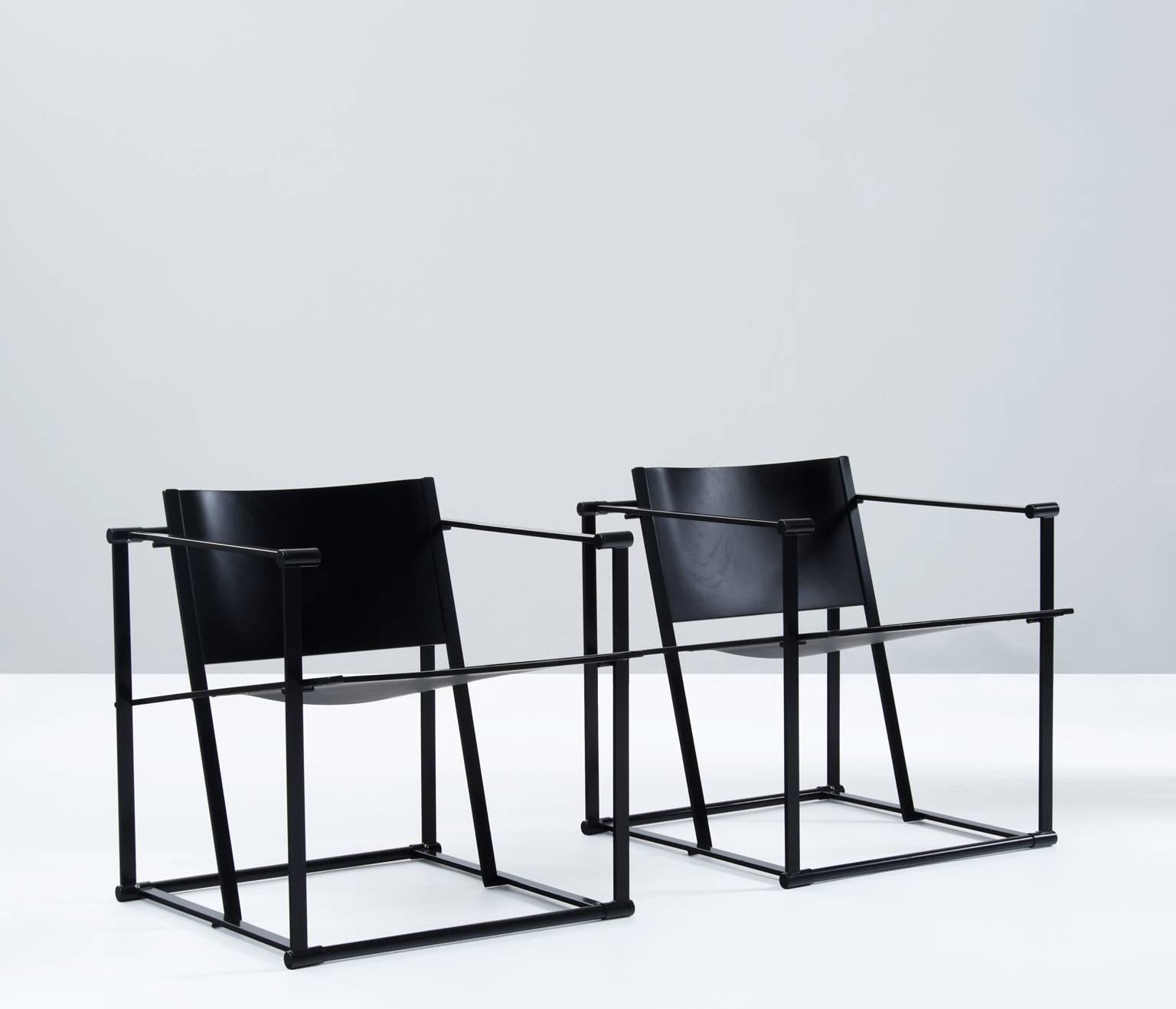 Set of two 'Cube' lounge chairs designed by Radboud van Beekum for Pastoe, the Netherlands 1980s.

Made of a black lacquered metal frame and black painted wooden seat and back. Sculptural design with a very comfortable seat. 

This chair was