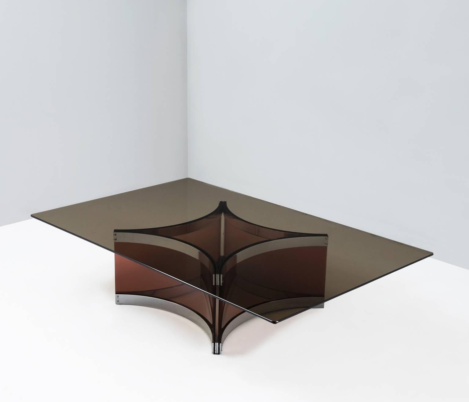Rectangular glass coffee table in two tones, Italy, 1970s.
Designed by Alessandro Albrizzi.

This well sized coffee table has a very unusual base. The top and base were made in two tones of smoked glass. 

The curved glass segments of the base