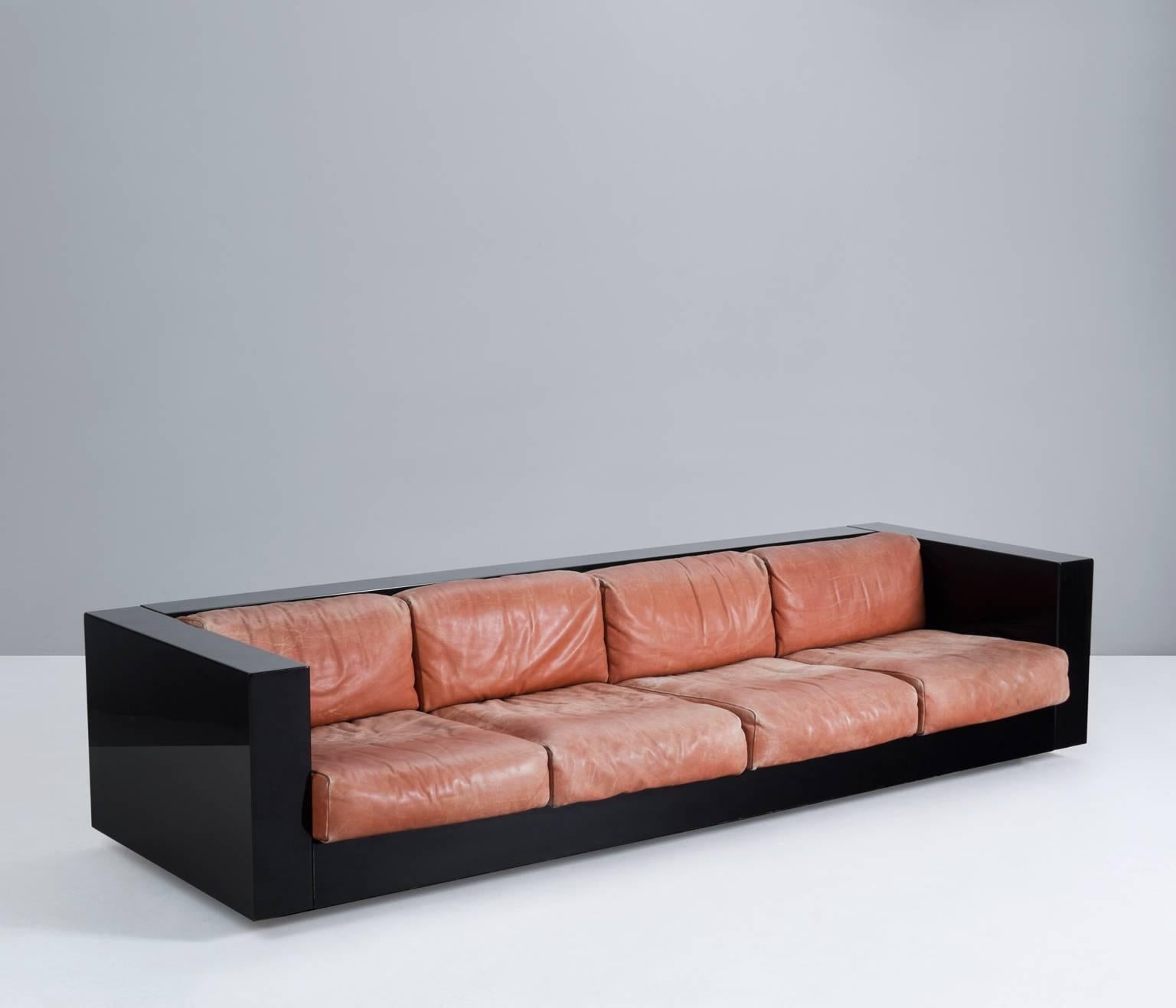 'Sartoga' sofa, in wood and leather, by Lella & Massimo Vignelli for Poltronova, Italy, 1964. 

Very large four-seat sofa 'Sartoga' by Italian designer couple Lella & Massimo Vignelli. The minimalistic rectangular elements of the body are very