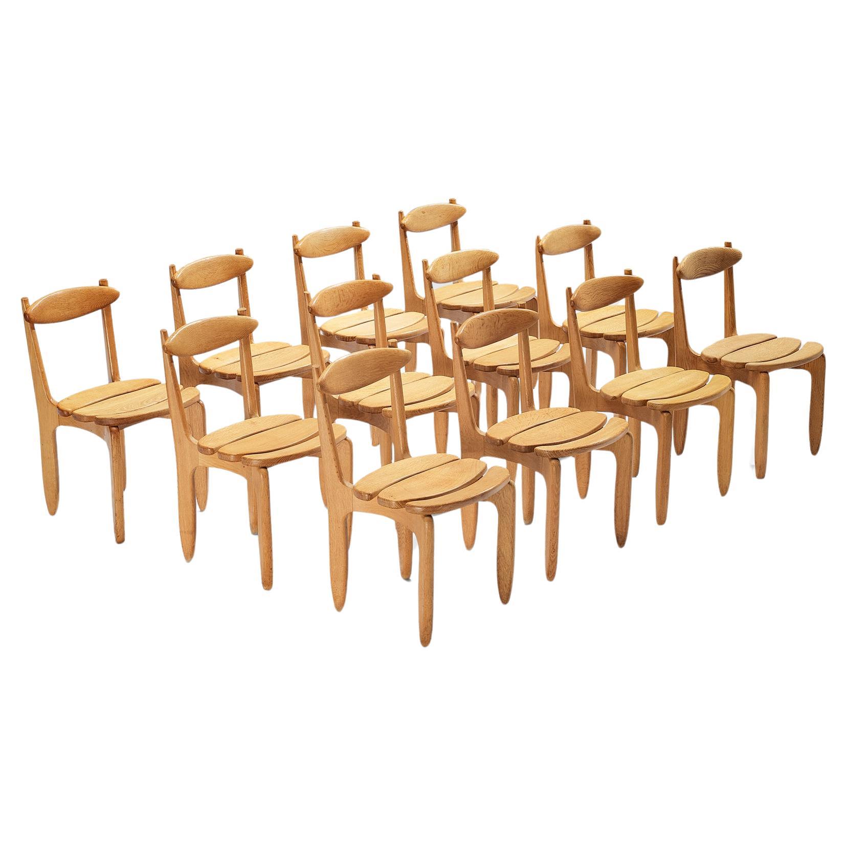 Guillerme & Chambron Set of Twelve Dining Chairs in Solid Oak For Sale