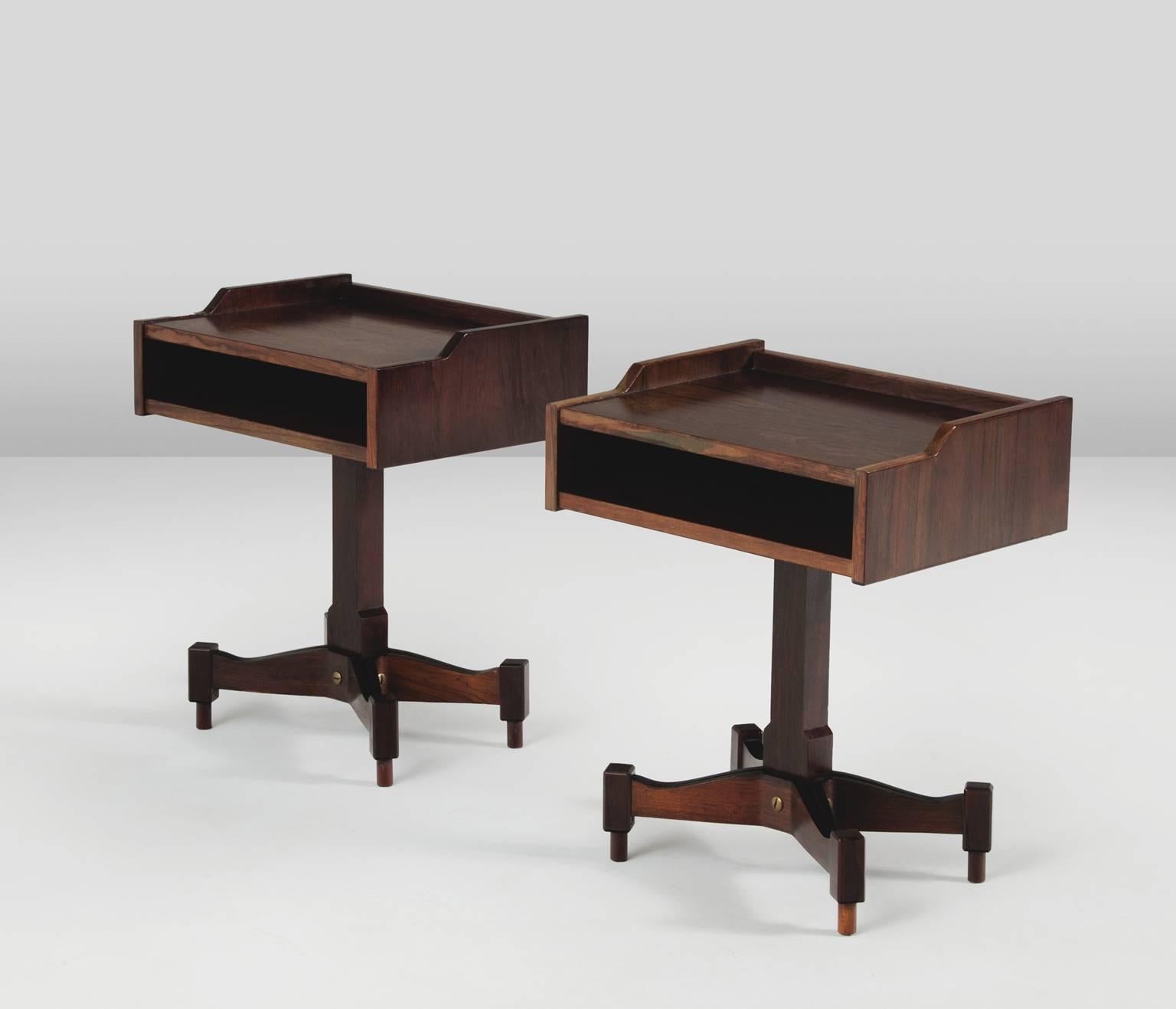 Pair of nightstands, in rosewood, by Claudio Salocchi for Sormani, Italy, 1960s. 

Pair of rosewood side tables with storage facility designed by Claudio Salocchi for Sormani, Italy early 1960s. The typical expressive highly detailed base