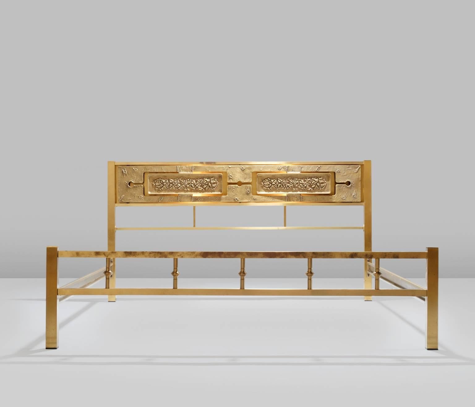 Very unusual large bed frame, Italy, 1950s. 

Remarkable design of the brass inlay sculptures into the headboard with lightning integrated.

The solid brass shows a wonderful patina, which can, when preferred can be polished to your own