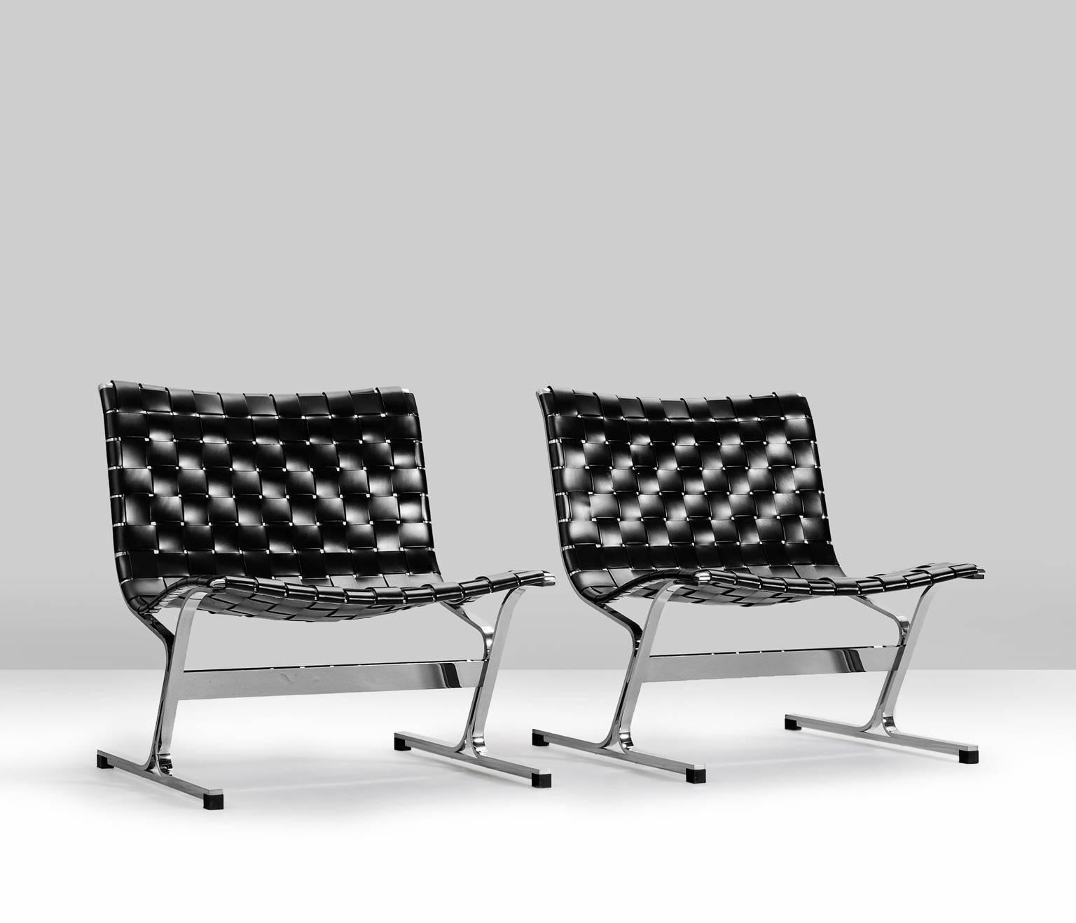 Refined set of two lounge chairs designed by Ross Littell, Milano, Italy, late 1960s.

This appealing set is tressed in an original high quality black saddle leather. Strapped
around an organic designed chromed steel base.

The interwoven