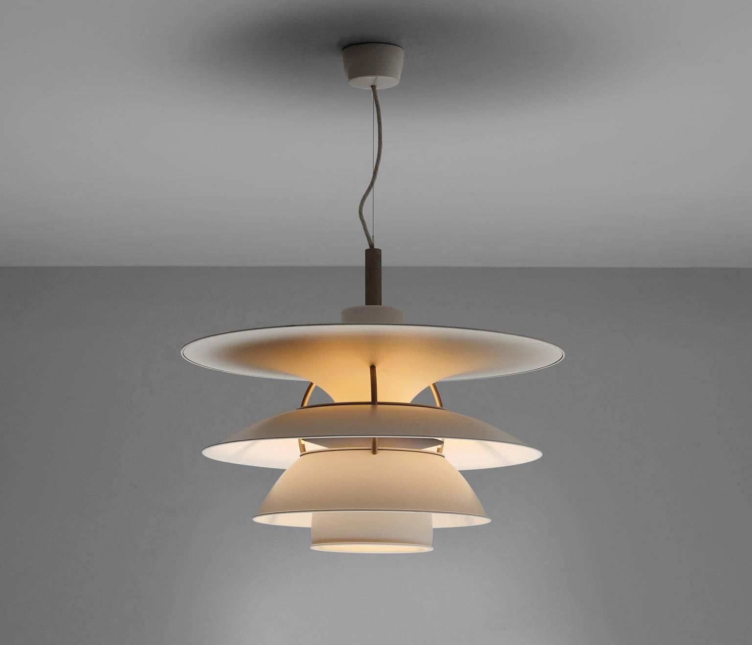 Charlottenburg' pendant, in metal, by Poul Henningsen for Louis Poulsen, Denmark, 1979.

White metal shades mounted on three steel ribs. The shades are designed for horizontal and vertical surfaces to indirectly illuminate a room. Provides a smooth,