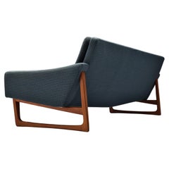 Comfortable Four Seat Sofa in Teak and Blue Upholstery