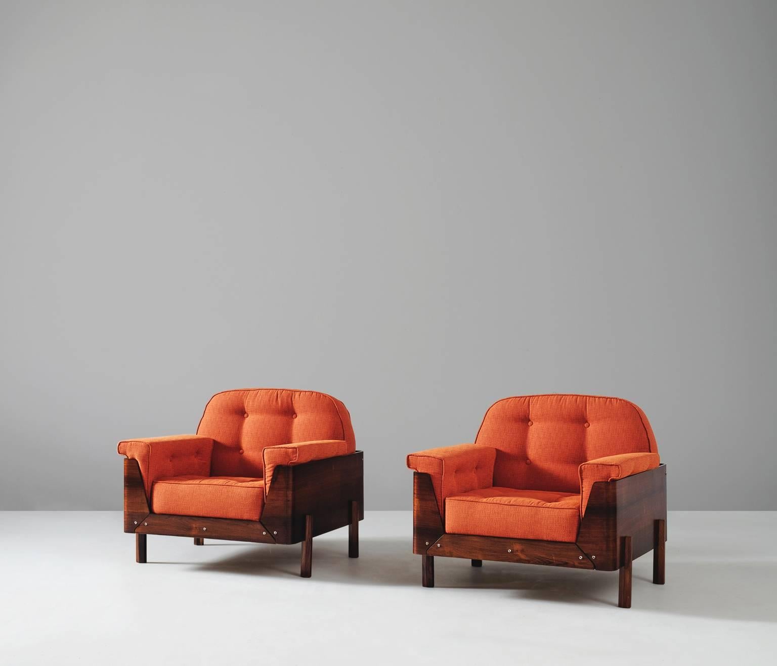 Vibrant pair of rosewood lounge chairs with skeletton backs designed by Jorge Zalszupin, Brazil, 1960s. 
 
Jorge Zalszupin was one of the collaborators and this set is therefore most likely designed with help of the Brazilian designer Jorge